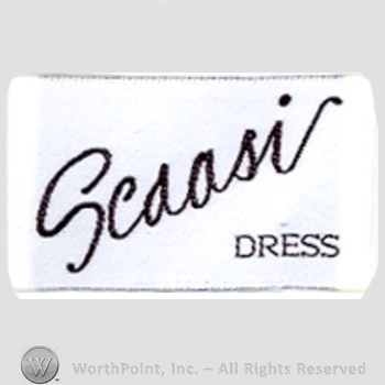 Clothing label : Arnold Scaasi.