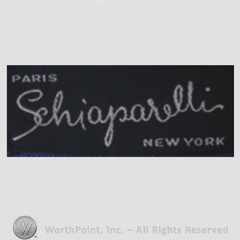 Clothing label : Elsa Schiaparelli.
