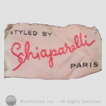 Clothing label : Elsa Schiaparelli.