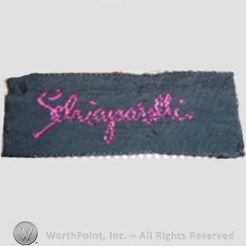 Clothing label : Elsa Schiaparelli.