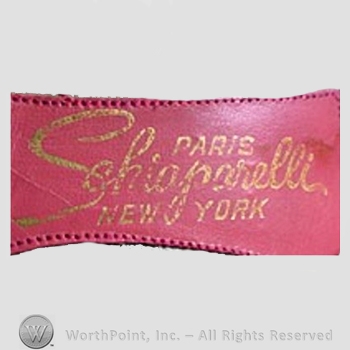 Clothing label : Elsa Schiaparelli.