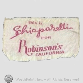 Clothing label : Elsa Schiaparelli.