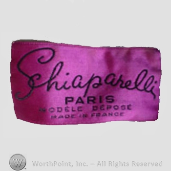 Clothing label : Elsa Schiaparelli.
