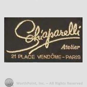 Clothing label : Elsa Schiaparelli.