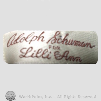 Clothing label : Adolph Schuman.