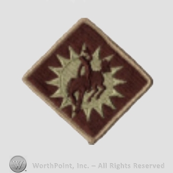 US Army Shoulder Sleeve Insignia: 115th Field Artillery Brigade.