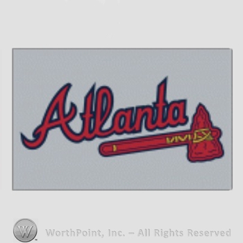 Atlanta Braves sport logo: Atlanta above a tomahawk on grey background.