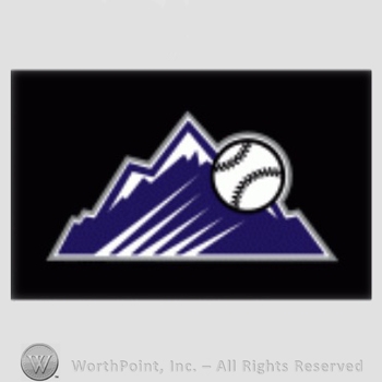 Colorado Rockies sport logo: Baseball over mountains on a black background.