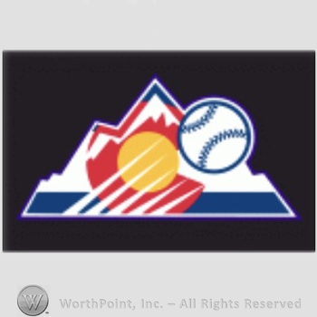 Colorado Rockies sport logo: Baseball over mountains on a black background.