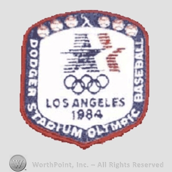 Los Angeles Dodgers sport logo: Olympic symbol above written Los Angeles 1984.