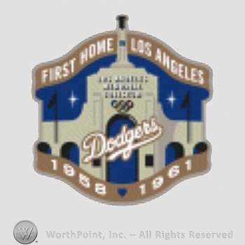 Los Angeles Dodgers sport logo: First Home in Los Angeles written above Olympic symbol; Dodgers 1958 - 1961 written below.