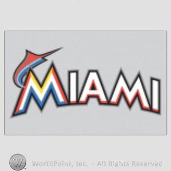 Miami Marlins sport logo: a marlin leaping over word Miami on a grey background.
