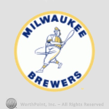 Milwaukee Brewers sport logo: a player with the body of a beer barrel swinging a baseball bat with a circle and team name Milwaukee Brewers written around.