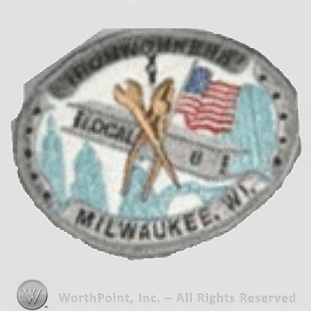 Milwaukee Brewers sport logo: Local 8 written, some tools and the American flag, all inside a circle.