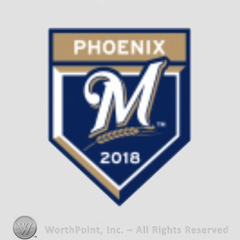 Milwaukee Brewers sport logo: Phoenix written above letter M.
