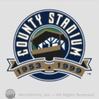 Milwaukee Brewers sport logo: County Stadium written in circle above a building and 1953 1999.