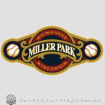 Milwaukee Brewers sport logo: Miller Dark written between two baseballs.