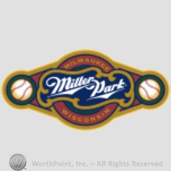 Milwaukee Brewers sport logo: Miller Dark written between two baseballs.