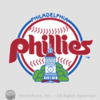 Philadelphia Phillies sport logo: independence Hall on baseball with Phillies script over; Philadelphia written above.