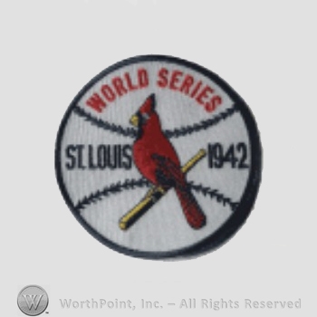 St. Louis Cardinals sport logo: cardinal on a baseball bat with a baseball on the background; World Series St. Louis 1942 written on the edge.