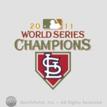 St. Louis Cardinals sport logo: 2011 World Series Champions written above a pennant with interlocked STL.