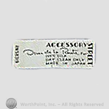 Clothing label : Oscar de la Renta.