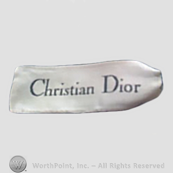 Clothing label : Christian Dior.