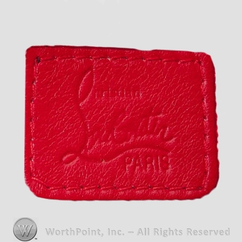 Clothing label : Christian Louboutin.
