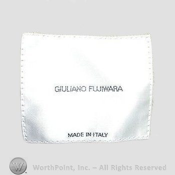 Clothing label : Issey Miyake.