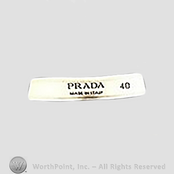 Clothing label : Prada.