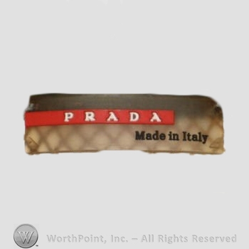 Clothing label : Prada.