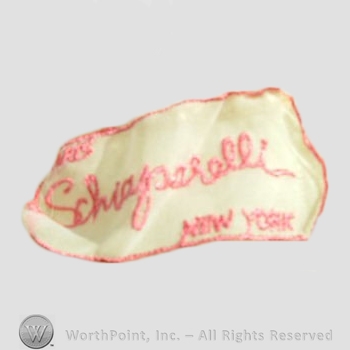 Clothing label : Elsa Schiaparelli.