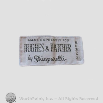 Clothing label : Elsa Schiaparelli.