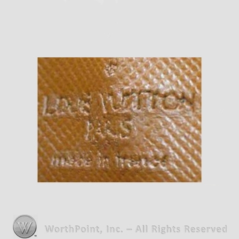 Clothing label : Louis Vuitton.