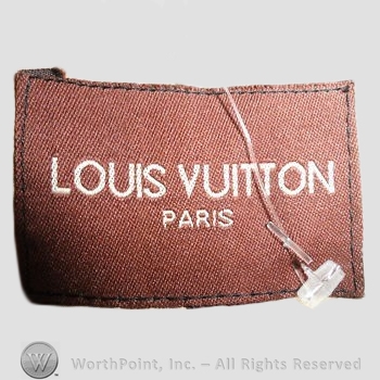 Clothing label : Louis Vuitton.
