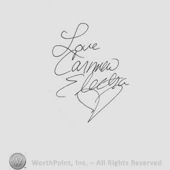 Signature: Carmen Electra.