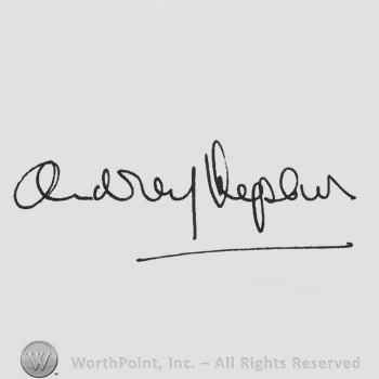 Signature: Audrey Hepburn.