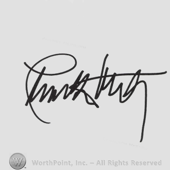 Signature: Charlton Heston.
