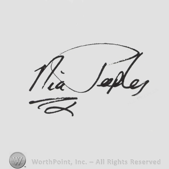 Signature: Nia Peeples.