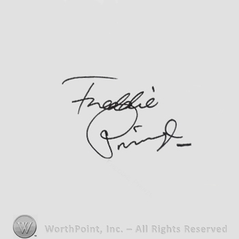 Signature: Freddie Prinze.