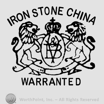 Two lions facing each other in a prance position woth a crown above an oval that contains the letters V&B under the phrase IRON STONE CHINA and above the word WARRANTED in uppercase letters 