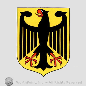 Heraldry: shield and eagle.