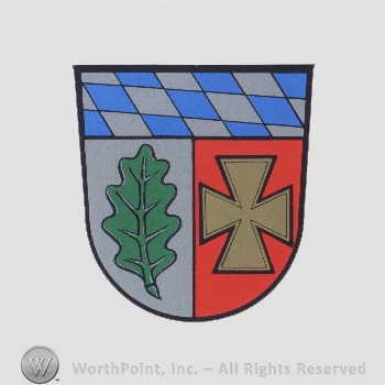 Heraldry: shield, oak leaf, maltese cross, pattern.