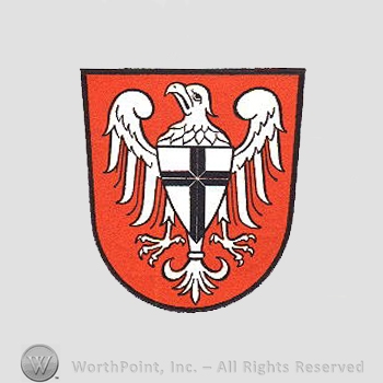 Heraldry: shield, white eagle, shield with a cross inside.