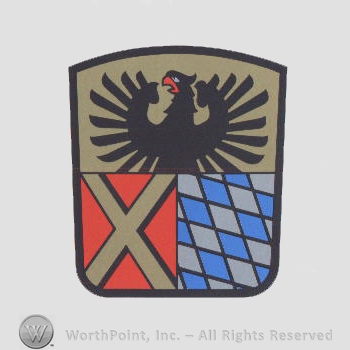 Heraldry: shield, eagle, cross, diamond pattern.