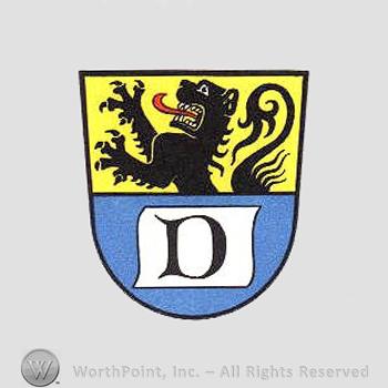 Heraldry: shield, lion, letter D.