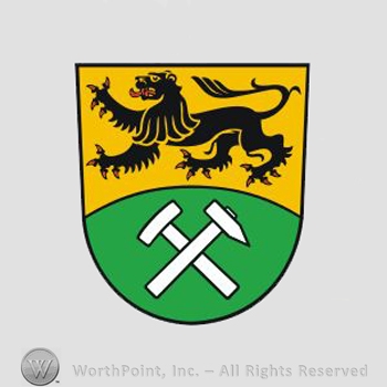 Heraldry: lion, crossed hammers, shield, green field.