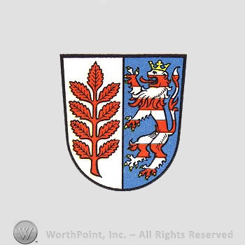 Heraldry: shield, leaves, lion with crown.