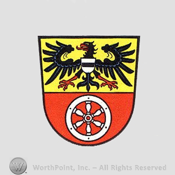 Heraldry: eagle, shield, wheel.