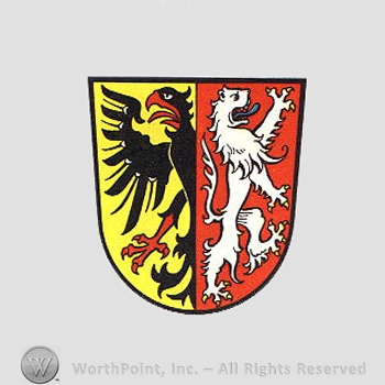 Heraldry: shield, eagle, lion.